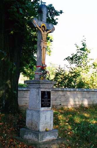 Memorial Cross in Greek Catholic Church Courtyard